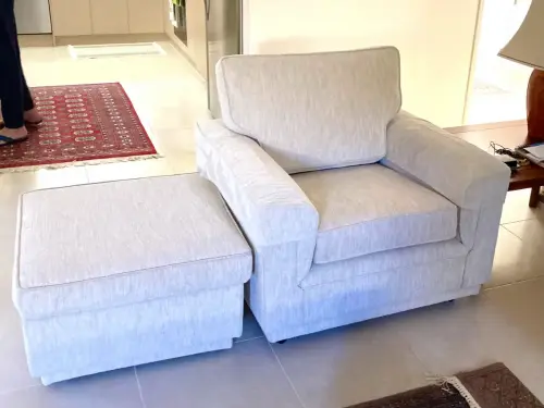 Close-up image of a reupholstered sofa and ottoman by Southside Upholstery Perth.